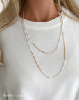 Lange wikkelketting roze