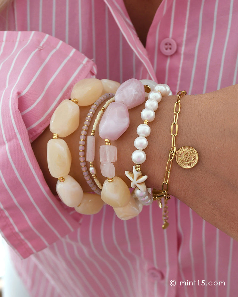 Armbandenset met roze blouse